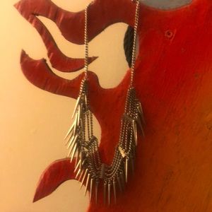 Silver spikes costume jewelry